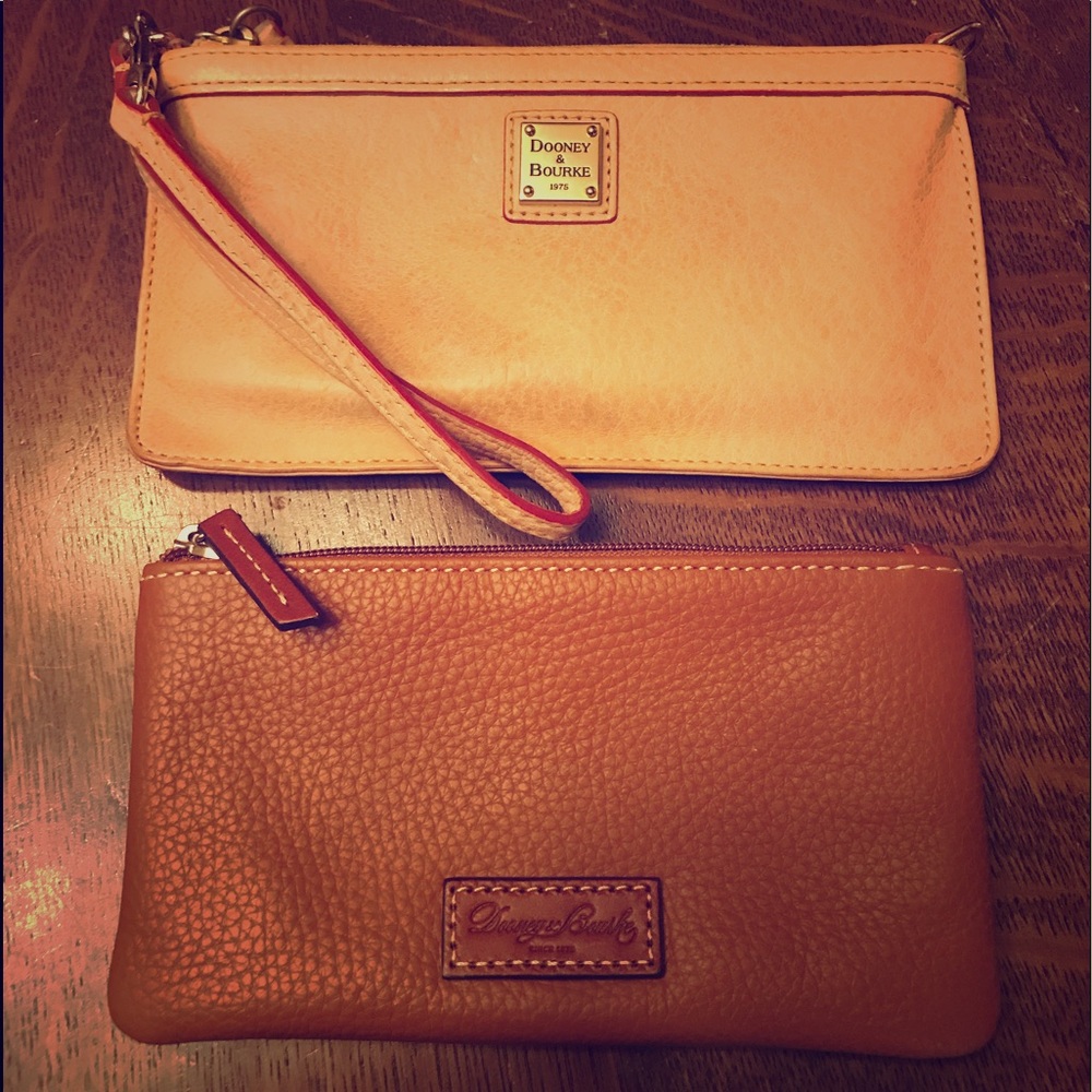 Pair of Dooney and Bourke wallets/clutches
